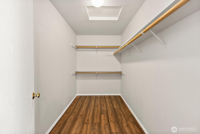 spacious closet with wood finished floors
