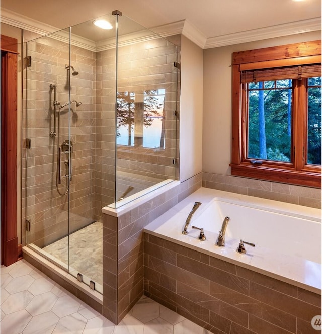 bathroom featuring tile patterned floors, a bath, ornamental molding, and a stall shower