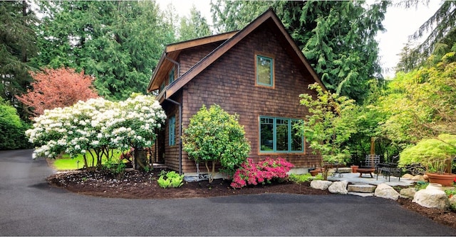 view of property exterior featuring a patio