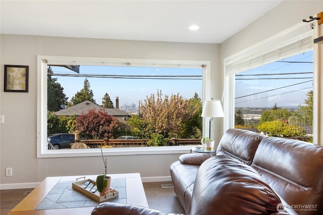 sitting room featuring recessed lighting, baseboards, dark wood finished floors, and visible vents