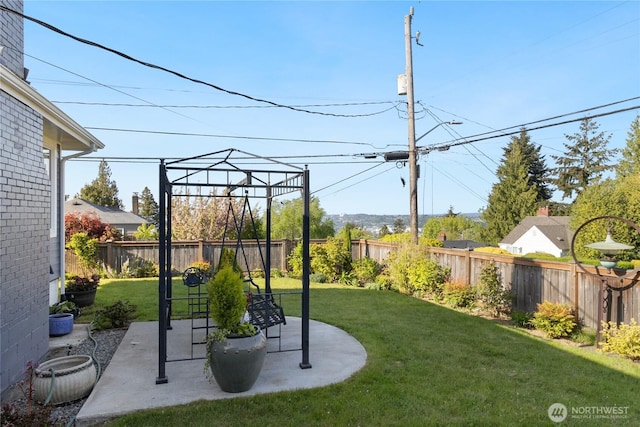 view of yard featuring a fenced backyard and a patio area