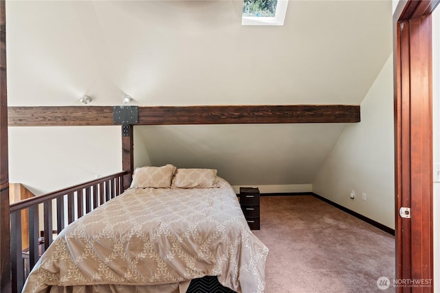 carpeted bedroom featuring baseboards and vaulted ceiling with beams