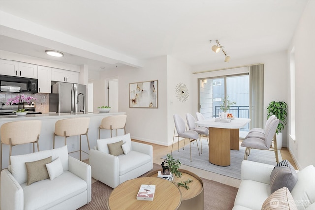 769 Hayes St Unit 405, Seattle, WA 98109 - living area with baseboards