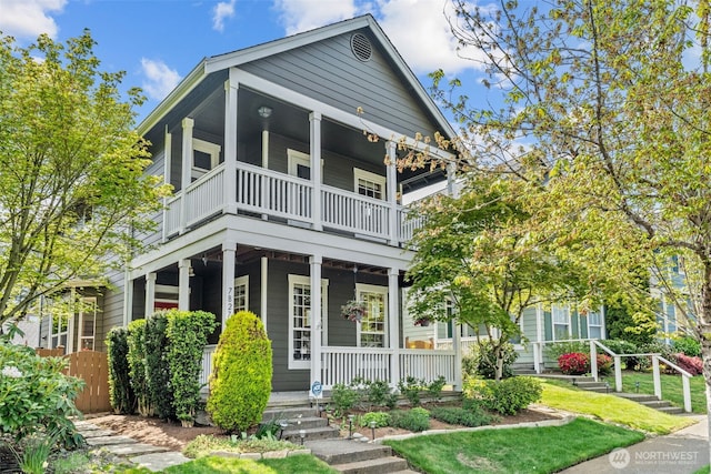 7827 Ingram Ln SE, Snoqualmie, WA 98065 - view of front of home with covered porch and a front lawn