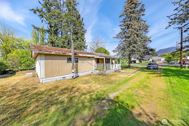 view of yard featuring a porch