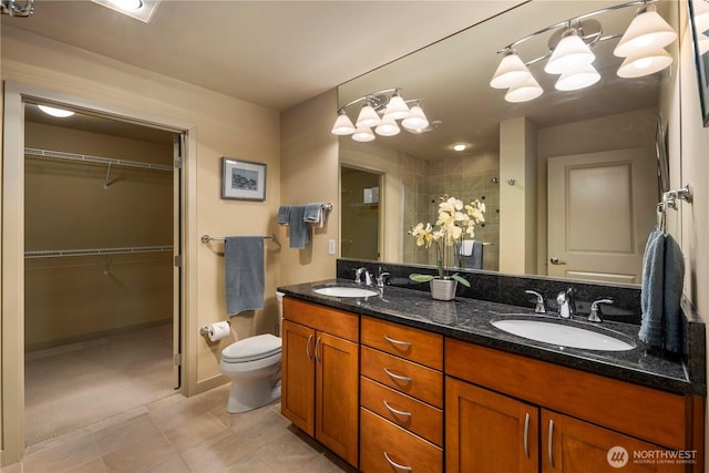 150 102nd Ave SE Unit 213, Bellevue, WA 98004 - full bathroom with double vanity, toilet, a sink, and a stall shower