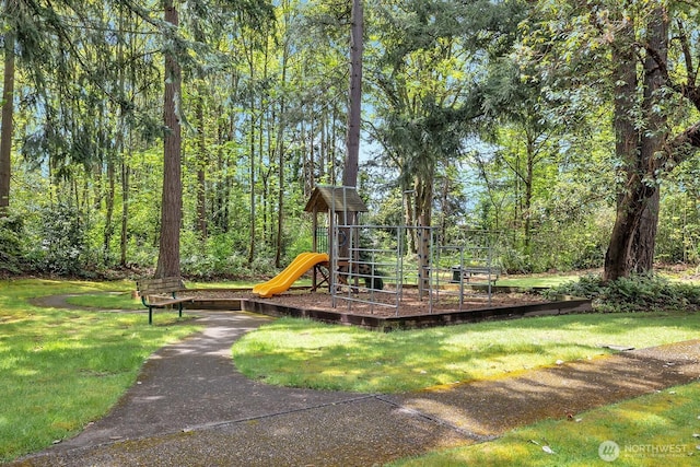 view of playground with a yard