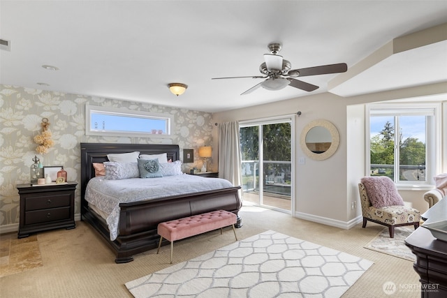 bedroom featuring access to outside, light carpet, baseboards, wallpapered walls, and visible vents