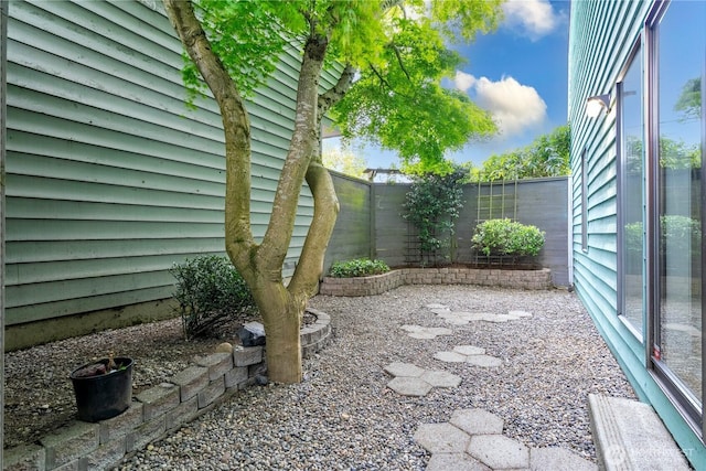 view of yard featuring a fenced backyard