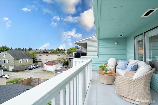 balcony featuring a residential view