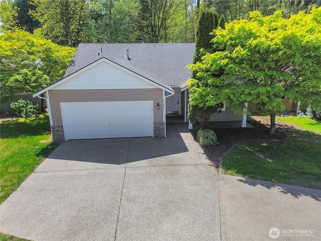 ranch-style house with stone siding, a front lawn, driveway, and an attached garage