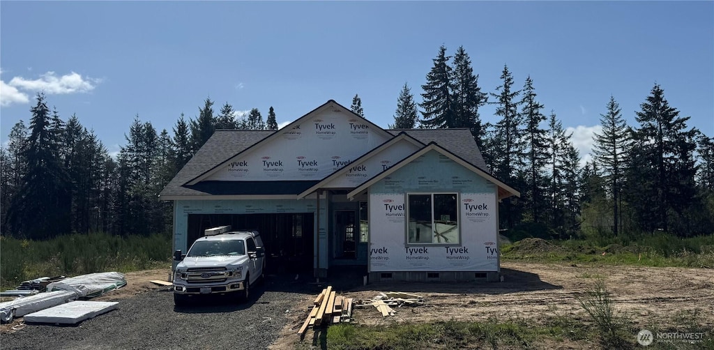 property in mid-construction featuring an attached garage
