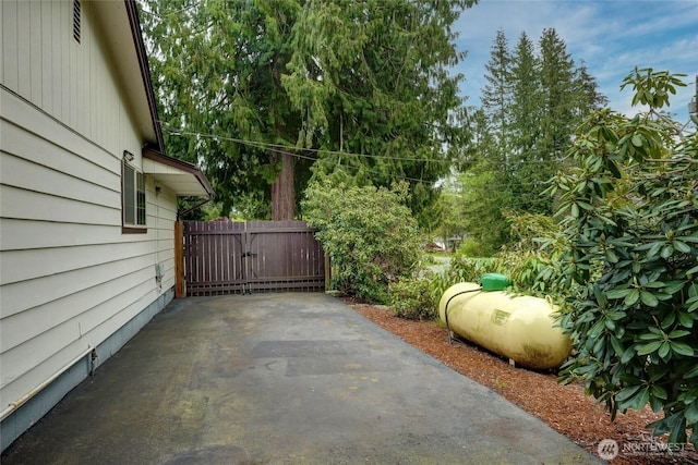 view of patio / terrace featuring a gate and fence