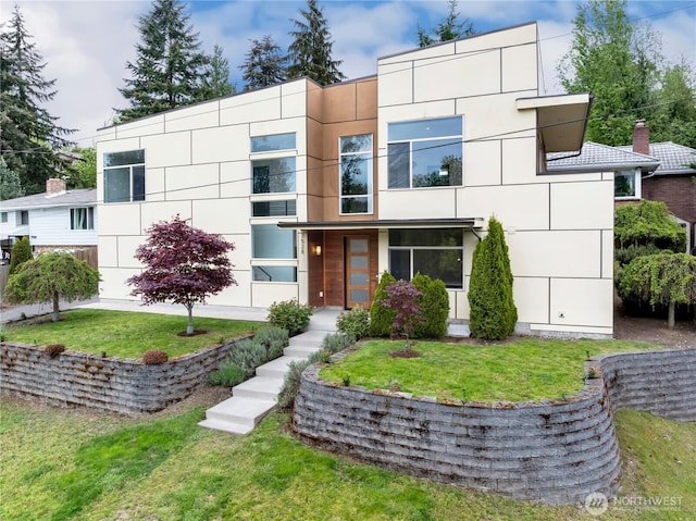 7528 21st Ave SW, Seattle, WA 98106 - view of front of property with stucco siding and a front lawn