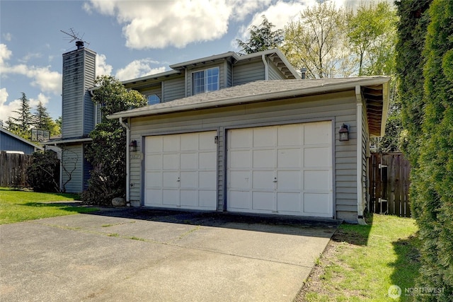 garage featuring fence