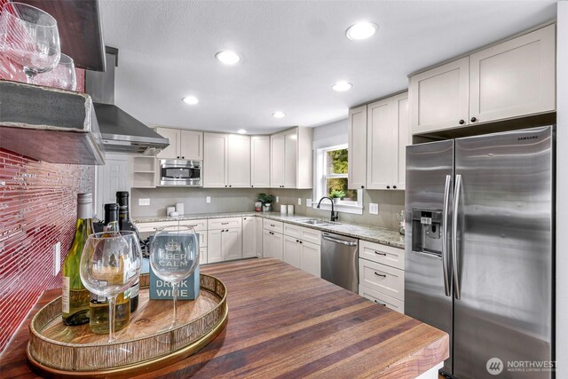 1626 106th Ave SE, Bellevue, WA 98004 - kitchen featuring a sink, stainless steel appliances, open shelves, recessed lighting, and white cabinets