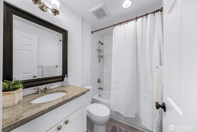 1626 106th Ave SE, Bellevue, WA 98004 - bathroom featuring toilet, visible vents, vanity, and shower / tub combo with curtain