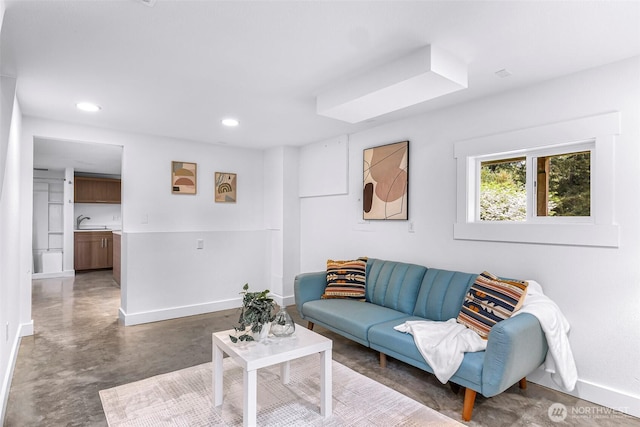 1626 106th Ave SE, Bellevue, WA 98004 - living room featuring concrete floors, baseboards, and recessed lighting