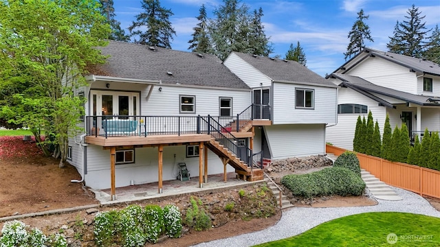 1626 106th Ave SE, Bellevue, WA 98004 - rear view of house with a deck, stairway, and roof with shingles