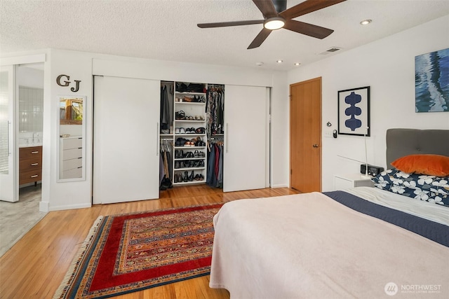 6614 N 49th St, Tacoma, WA 98407 - bedroom with recessed lighting, a ceiling fan, wood finished floors, visible vents, and a closet