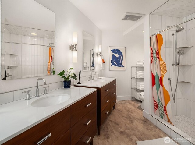 6614 N 49th St, Tacoma, WA 98407 - bathroom featuring visible vents, vanity, toilet, and a shower stall