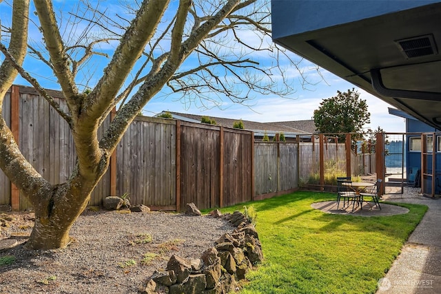 6614 N 49th St, Tacoma, WA 98407 - view of yard with a fenced backyard and a patio area