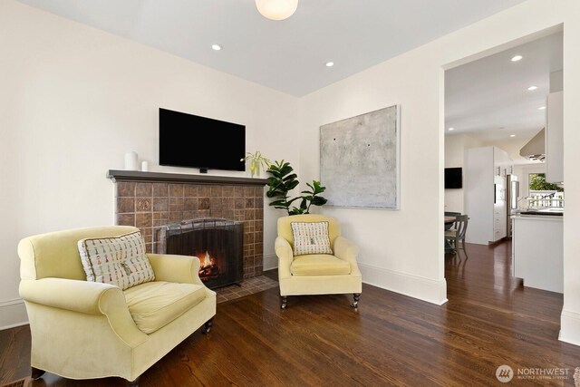 514 30th Ave E, Seattle, WA 98112 - living area with baseboards, recessed lighting, wood finished floors, and a fireplace
