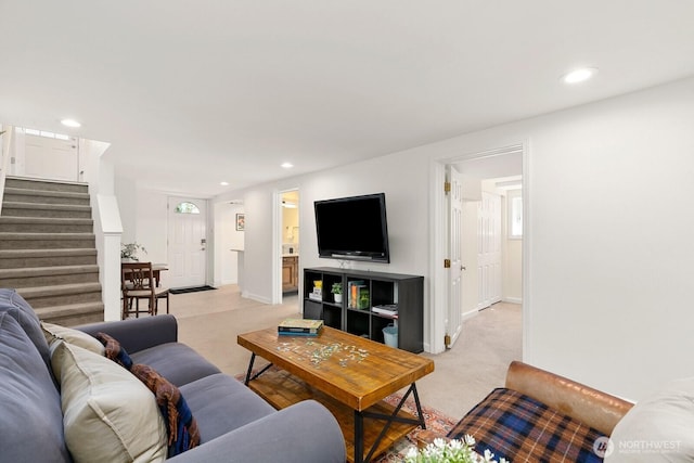 514 30th Ave E, Seattle, WA 98112 - living room with light colored carpet, recessed lighting, baseboards, and stairway