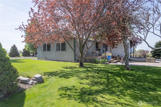 view of yard featuring a porch