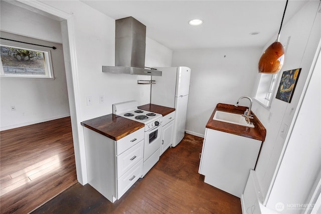 kitchen with wooden counters, dark wood finished floors, a sink, white range with electric stovetop, and wall chimney exhaust hood