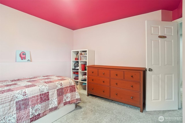 bedroom with light carpet