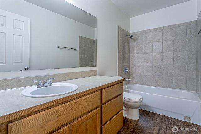 8342 49th Loop SE, Olympia, WA 98513 - full bathroom featuring vanity, toilet, wood finished floors, and bathtub / shower combination