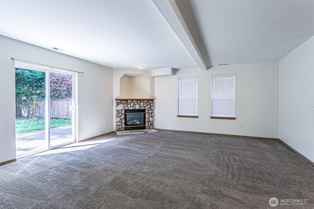 8342 49th Loop SE, Olympia, WA 98513 - unfurnished living room with a fireplace, carpet flooring, baseboards, and beamed ceiling