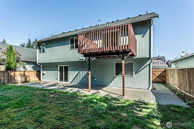 8342 49th Loop SE, Olympia, WA 98513 - back of house with a yard, a patio area, a deck, and a fenced backyard
