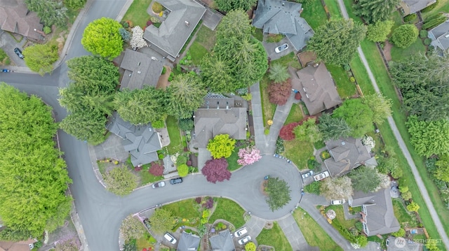 birds eye view of property with a residential view