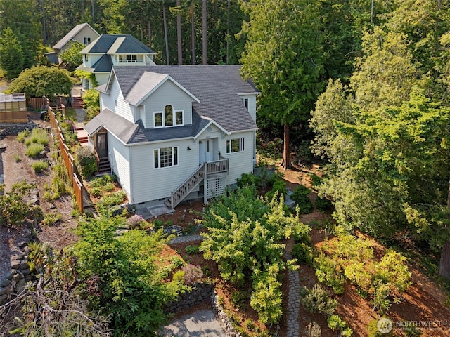 4375 Erin St, Port Townsend, WA 98368 - view of front of house with stairs, a shingled roof, and a wooded view