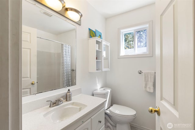4375 Erin St, Port Townsend, WA 98368 - bathroom with vanity, toilet, and curtained shower
