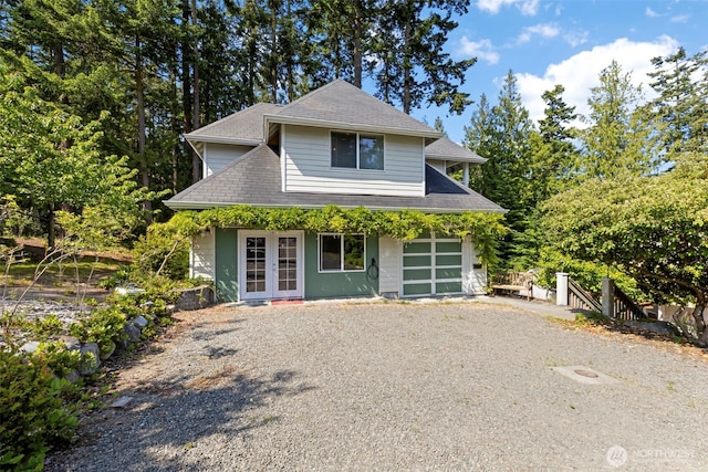 4375 Erin St, Port Townsend, WA 98368 - view of front of home with french doors, driveway, and a shingled roof