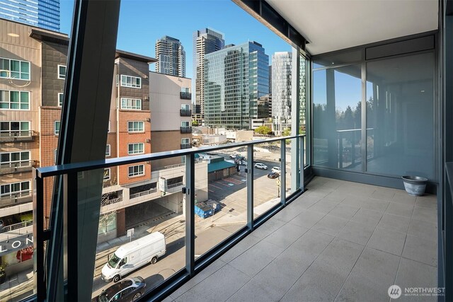 balcony featuring a view of city
