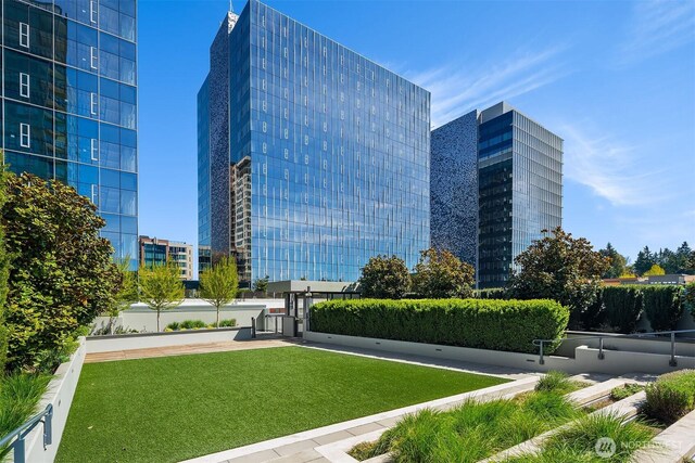surrounding community with a lawn