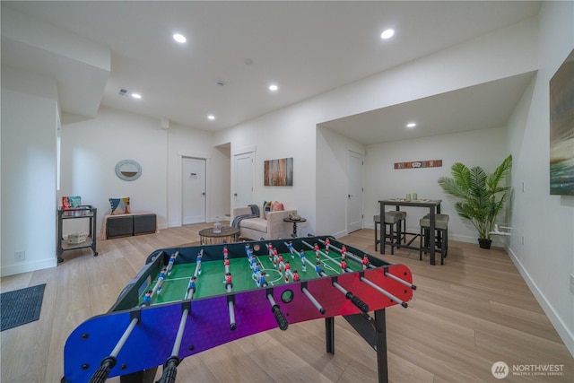 playroom with wood finished floors, recessed lighting, and baseboards