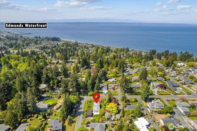 bird's eye view featuring a water view and a residential view