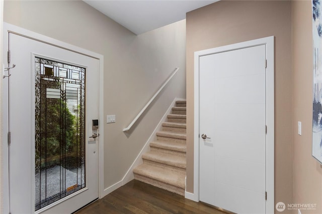 11508 SE 83rd St, Newcastle, WA 98056 - foyer entrance featuring stairway, baseboards, and dark wood-type flooring