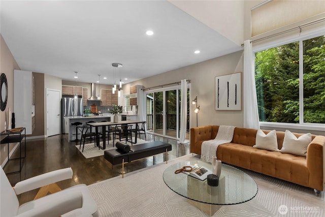 11508 SE 83rd St, Newcastle, WA 98056 - living room featuring wood finished floors, a wealth of natural light, and recessed lighting