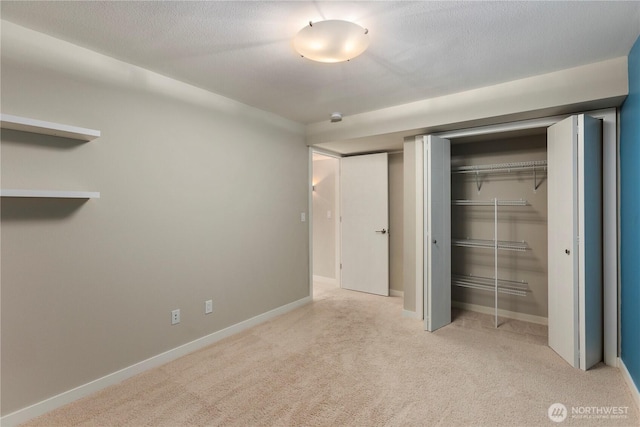 11508 SE 83rd St, Newcastle, WA 98056 - unfurnished bedroom featuring baseboards, a closet, and carpet floors