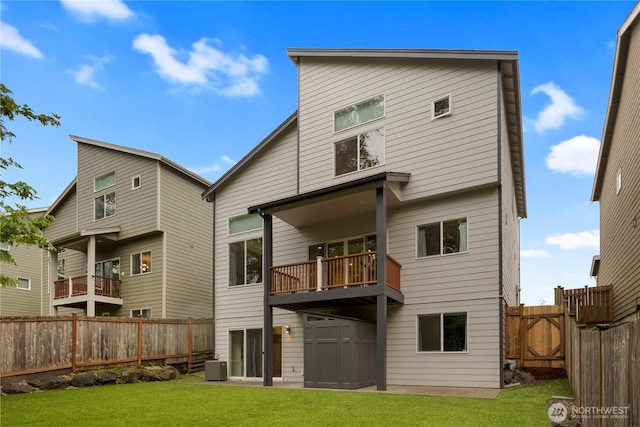 11508 SE 83rd St, Newcastle, WA 98056 - back of property with central AC unit, a lawn, a fenced backyard, and a balcony