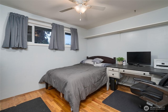 1705 36th St, Anacortes, WA 98221 - bedroom featuring wood finished floors, a desk, ceiling fan, and baseboards