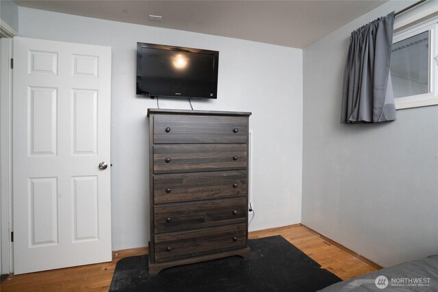 1705 36th St, Anacortes, WA 98221 - bedroom with wood finished floors and baseboards
