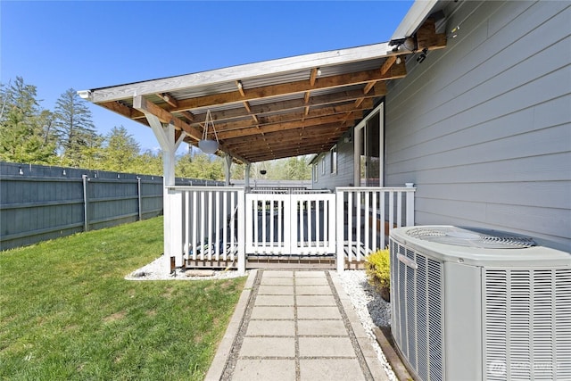 view of yard with fence and cooling unit
