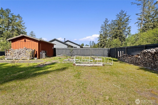 view of yard featuring a garden and fence